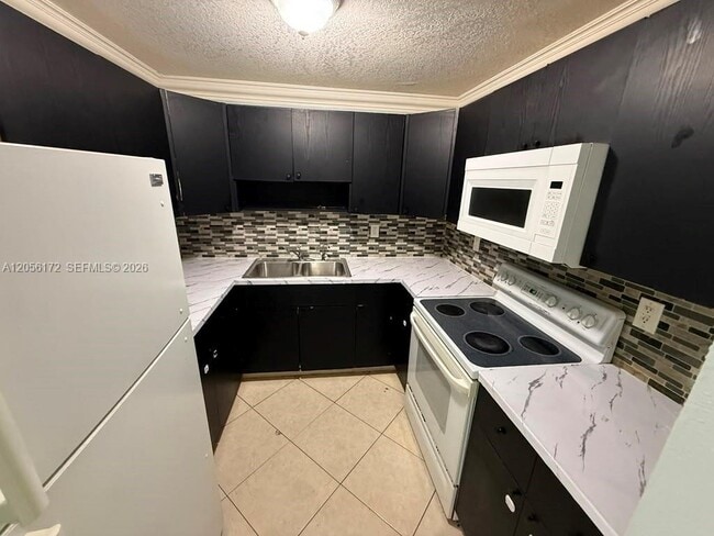 Photo - 1055 W 77th St Unit 309