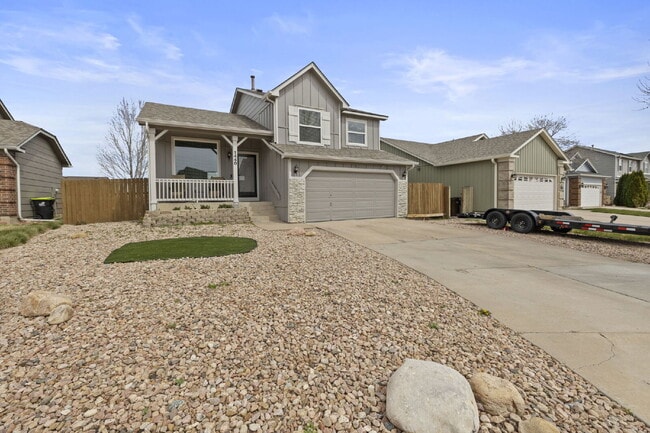 Building Photo - Spacious 4-Bedroom Home with Fenced Yard, 2-Car Garage & Scenic Views in Cheyenne Meadows