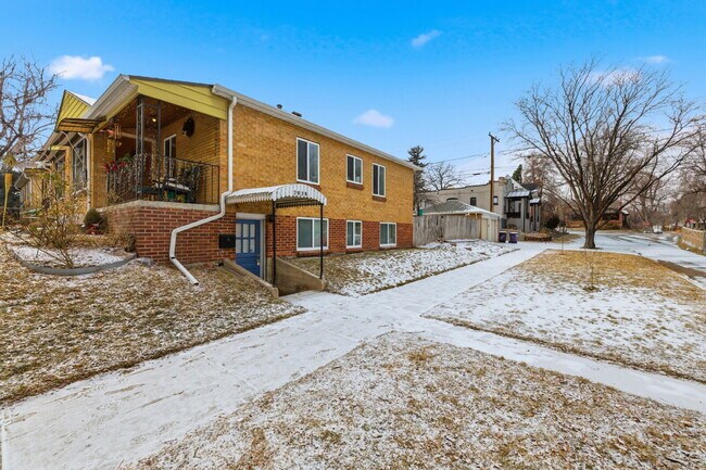 Photo - Renovated studio with garage + utilities included! Modern kitchen with island, updated bath, on-s...