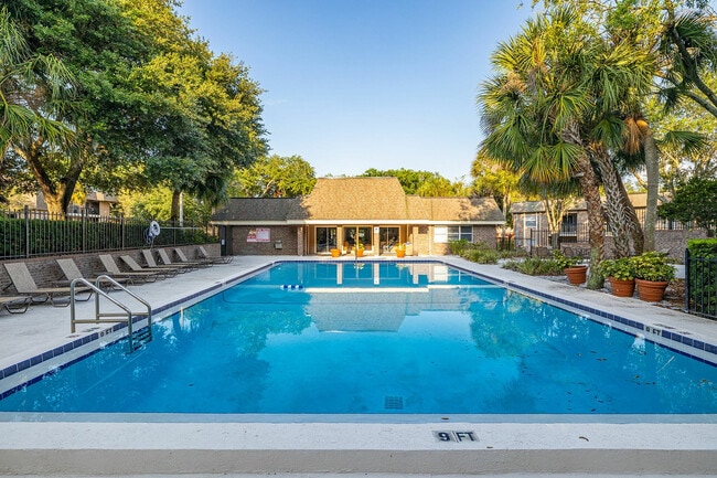 Relax and unwind in this serene poolside escape, perfect for enjoying sunny days.