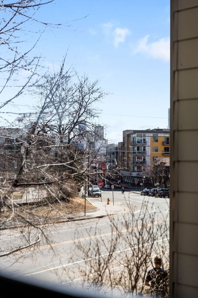 Photo - Modern 2BD, 1.5BA Condo with 20' Ceilings and Garage Parking Spot