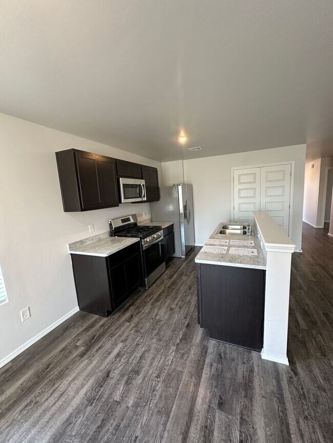 Photo - Now Available — Your Spacious 4 Bed, 2 Bath Home in Robertson’s Landing Awaits!