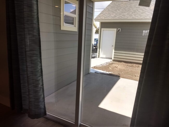 Fenced and landscaped back yard. This is not a current picture. Landscaping was added - 712 N 12th St