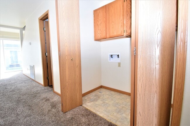Photo - Townhouse style 2 bedroom 1.5 Bath with Attached Garage! Great Location! Unit C