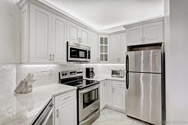 Photo - 500 Uno Lago Dr Unit 402