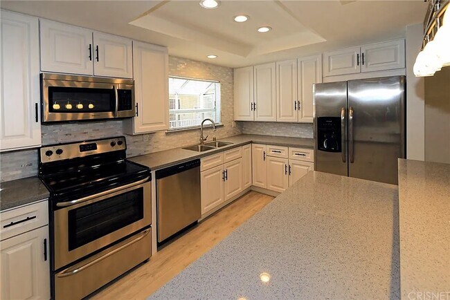Photo - 4950 Louise Ave Unit 309