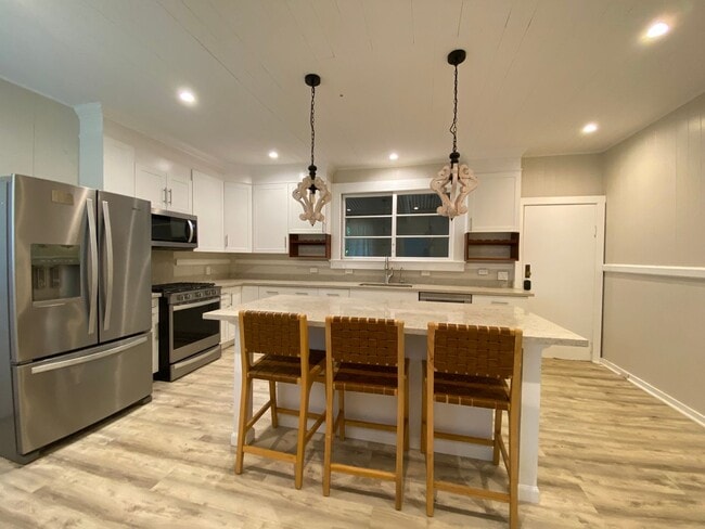 Photo - Furnished Plantation Home with 3 Bedrooms, 2 Bath large enclosed porch on almost 2 acres with oce...