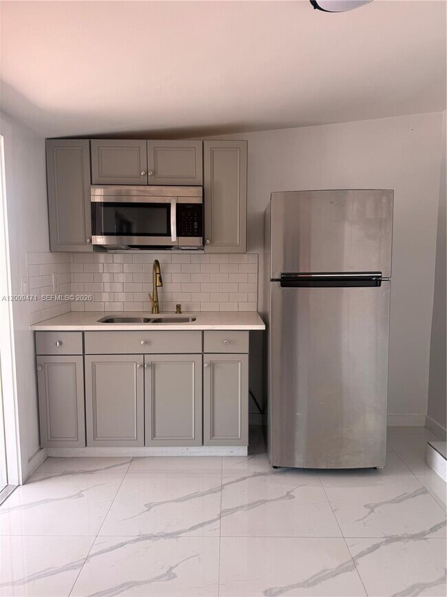 Building Photo - 3690 W 8th Ave Unit c