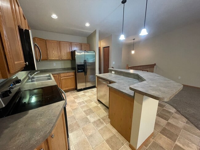 Photo - Pet-Friendly 3 Bed Twin Home with Patio & Garage