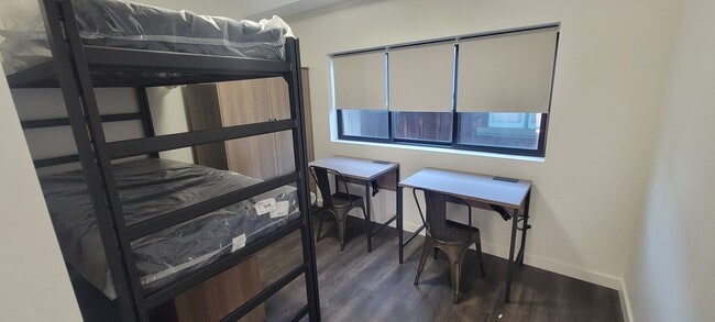 Photo - Double Bed Unit - Right Corner-: Entirely ... Unit D - Room 5