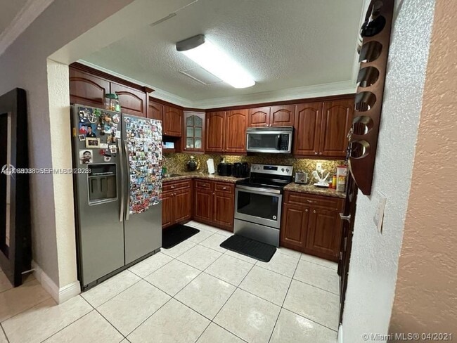 Photo - 12860 SW 43rd Dr Unit 244-B