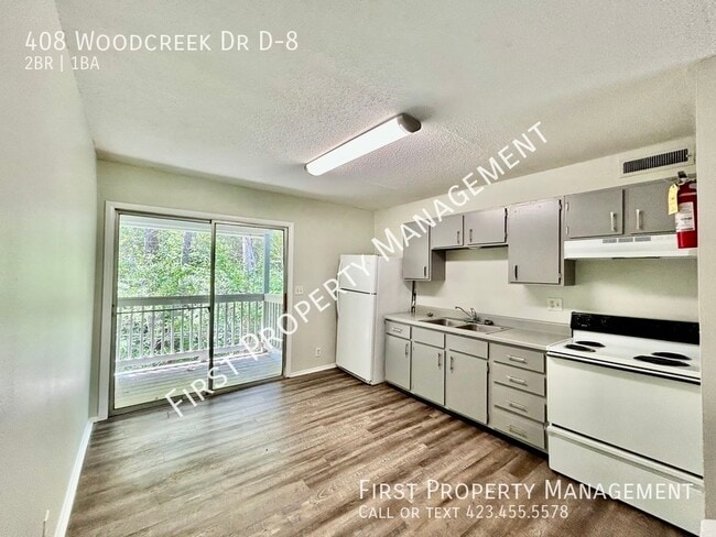 Building Photo - 408 Woodcreek Dr Rental