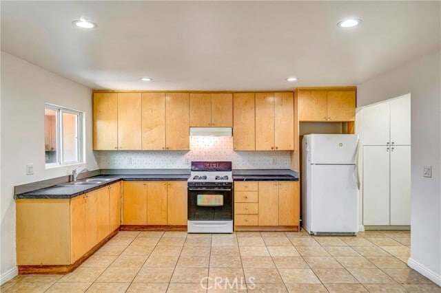 Building Photo - 6735 Elmer Ave Unit 12