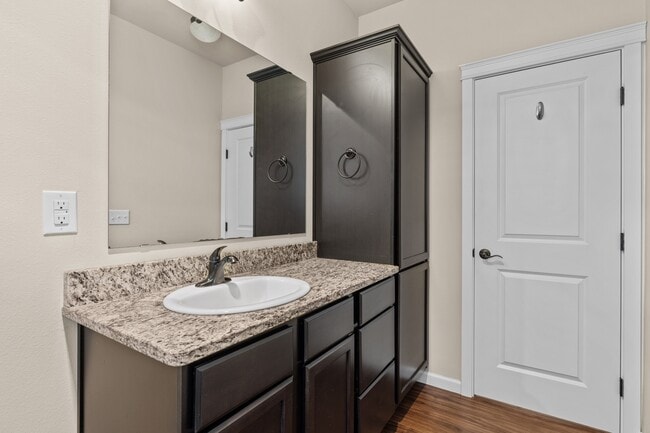 Apartment Bathroom with Granite Countertops