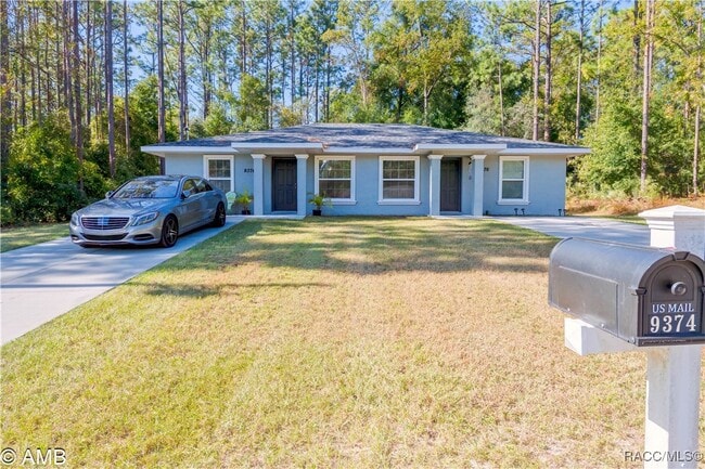 Building Photo - 9374 N Peachtree Way Rental