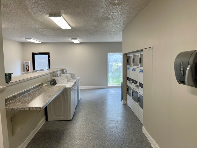 Lavandería comunitaria - Wellington Club & Apartments