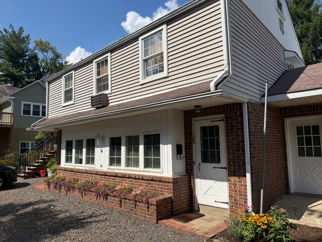 Front door on ground floor. Stairs lead you to 2nd floor apartment. - 106 Morgan Ave Unit 1bd/1ba 106 Morgan