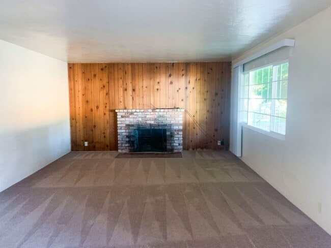 Photo - Pet-friendly home with a fenced backyard &...