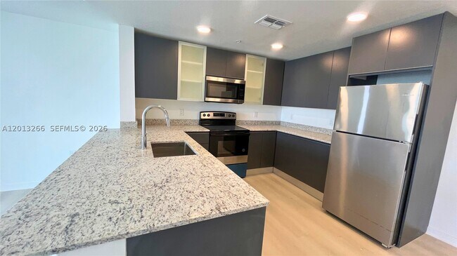 Photo - 5579 Millennia Park Dr Unit 318