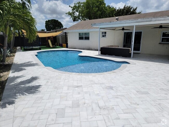 Building Photo - 12041 NW 34th Pl Rental