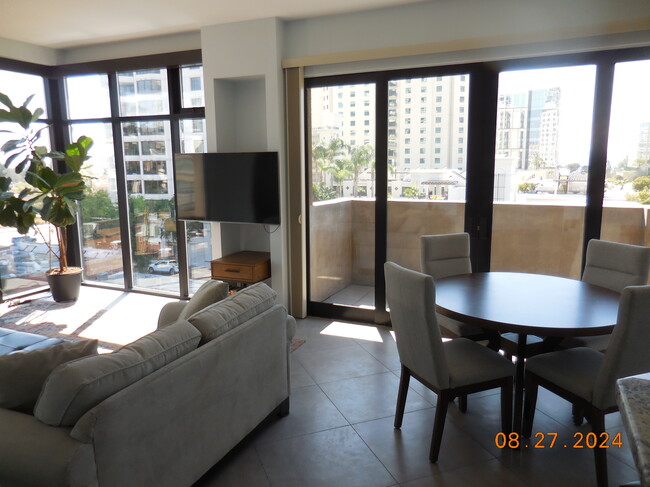 Dining to Living room with deck off dining - 611 W G St Condo Unit #404