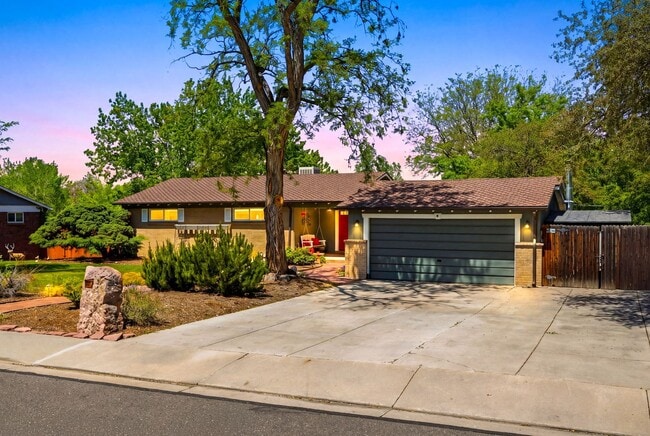 Building Photo - Sprawling 6 BR 4 BA Applewood Paradise - Live in Luxury with this Entertainer's Dream!