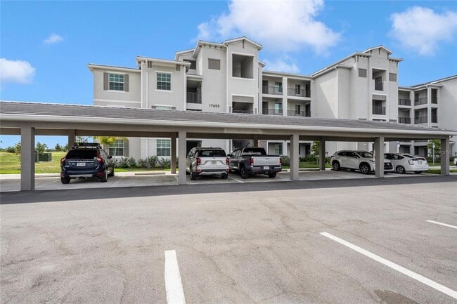 Building Photo - 17655 Opal Sand Dr Unit 203