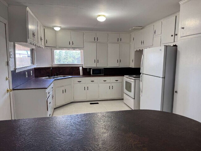 Photo - "Charming 2-Bed Home with Gleaming Hardwood Floors in Central Lubbock – 1274 Sq. Ft. of Cozy Livi...
