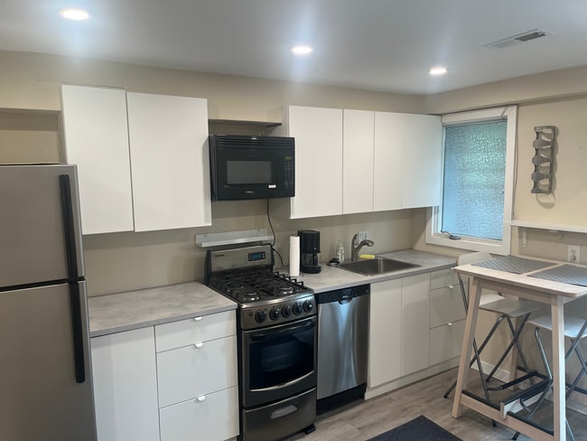 Kitchen, includes stove, microwave, dishwasher, all new cabinets - 803 Euclid Street Northwest Unit Euclid St Studio