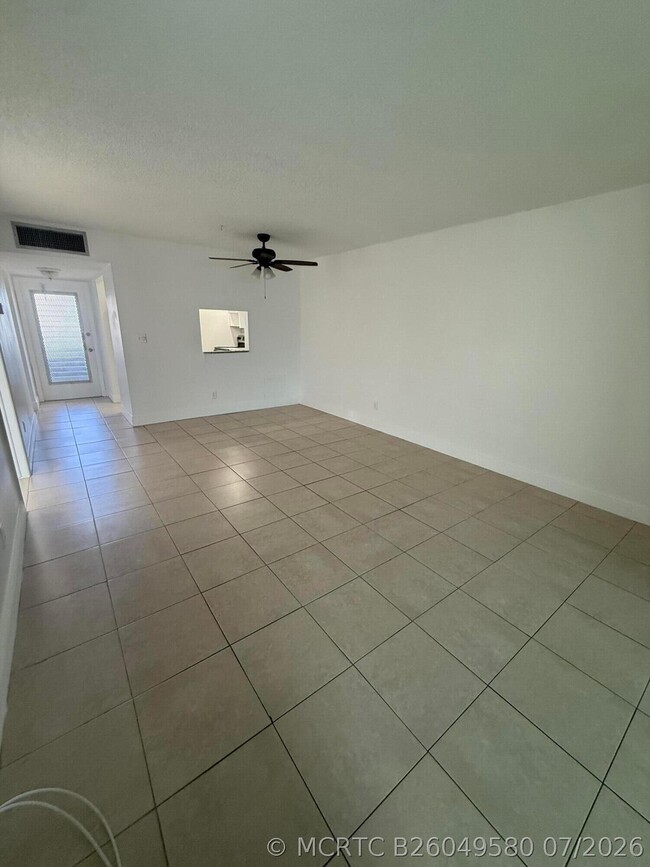 Building Photo - 5750 NW 64th Ave Unit 106