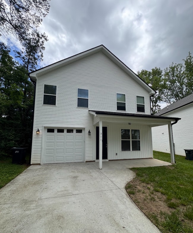 Building Photo - STOP SCROLLING! YOUR NEXT HOME IS HERE!