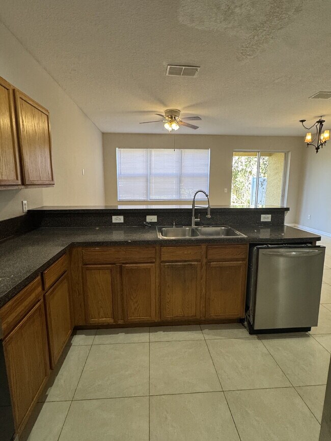 Photo - "Charming 3-Bed Oasis in Tampa's Heart – Spacious 1,443 Sq. Ft. with 2.5 Baths!"