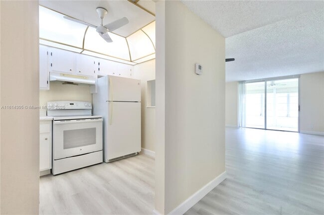 Building Photo - 6870 Royal Palm Blvd Unit 210M Rental