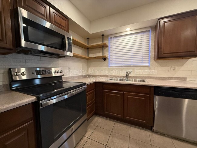 Building Photo - 6565 N 19th Ave Unit Apt 19