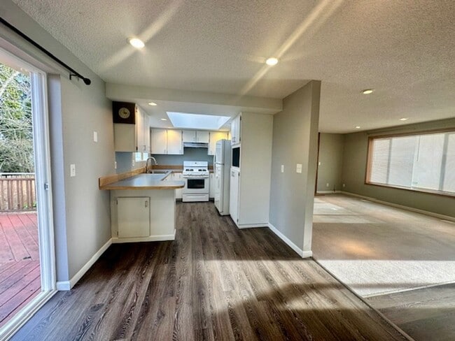 Photo - 4 bedroom -Split level and large deck/fenced yard!