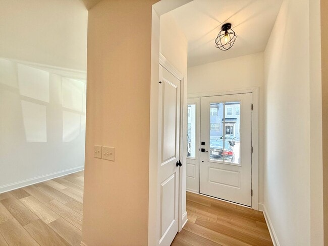 Photo - **OFFERING $125 RENT DISCOUNT FOR FIRST 6 MONTHS** Newly Built 4BD, 3.5BA Raleigh Townhome in a G...