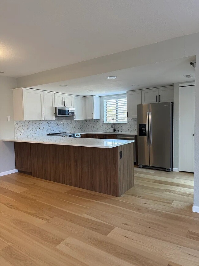 Photo - Newly Remodeled 1-Bed 1-Bath Townhome with Garage Parking – Available Now!