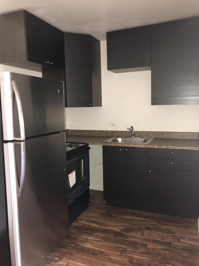 Photo - 1 bed, 1 bath apartment now available! Utilities included! Unit #106