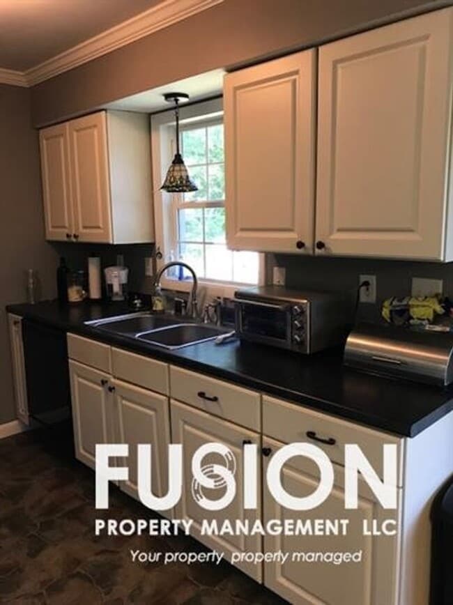 Photo - Spacious 3-Bedroom Home with POOL, Garage & Fenced Yard – New North End