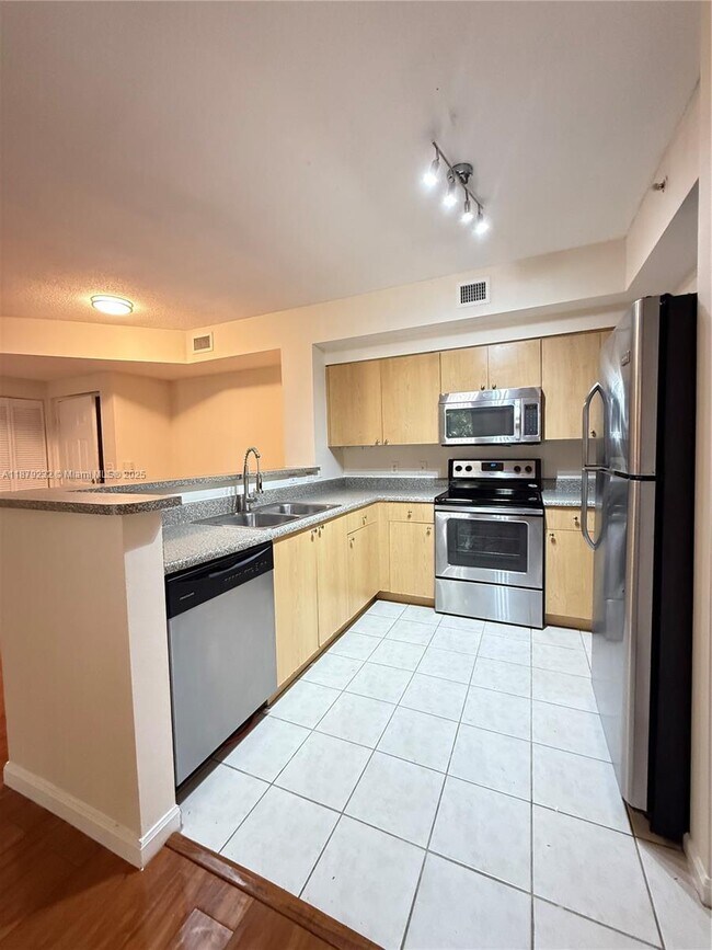 Photo - 7940 N Nob Hill Rd Unit 204