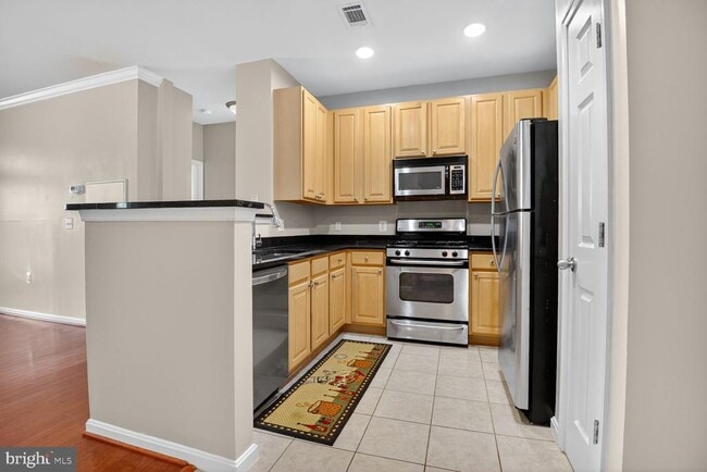 Building Photo - 2465 Army Navy Dr Unit 205 Rental