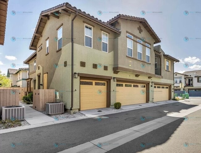Building Photo - Discover luxurious living in this stunning 3-bedroom, 2-bathroom, 2-story condo, perfectly design...