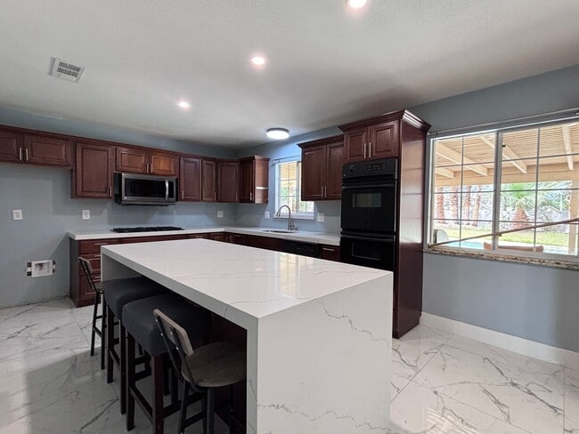 Photo - Spacious 4BR Single-Story with Pool, RV Parking & Large Lot Near Shopping & Dining