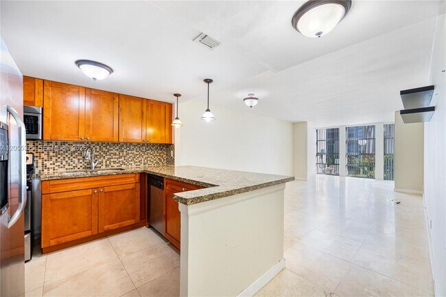Photo - 601 Three Islands Boulevard Unit 112