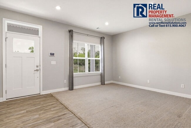 Photo - Great 4 bd 2.5 ba with attached garage and large deck!