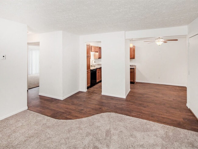 Hardwood-Style Flooring and Plush Carpeting - Forest Pointe