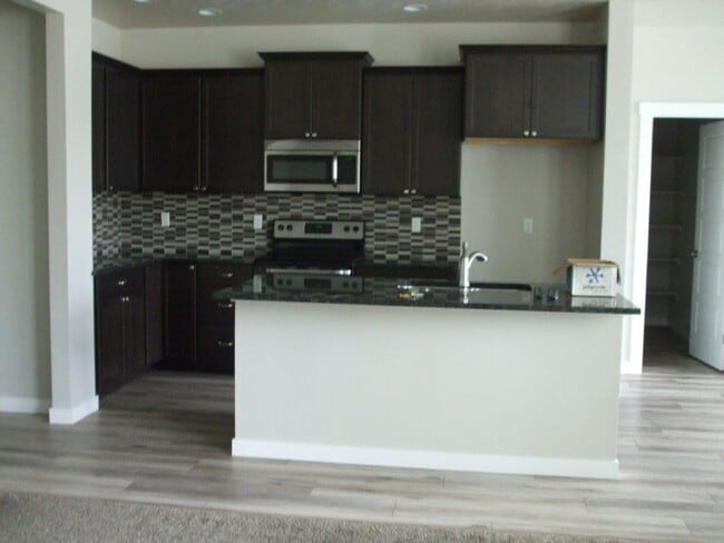 Photo - Beautiful  4 bed, 2.5 bath 2 car with extra deep bay and an additional office