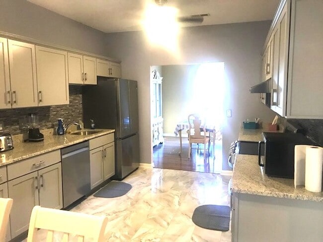 Photo - 4 Bedroom, 2.5 Bath, Pet Friendly Home with Fenced Yard & Sunroom! Available Soon!