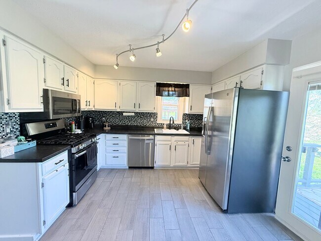 Photo - Updated 3-Bedroom Home with Fenced Yard & 2-Car Garage