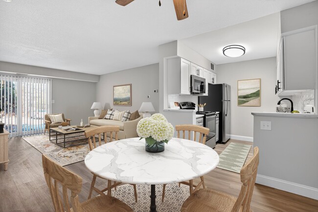 Welcome to Bay Ridge at Nashua Apartments, where modern comfort meets inviting spaces. Enjoy a stylish kitchen, cozy living area, and elegant dining setup perfect for gatherings. Schedule a tour today and envision your new home!